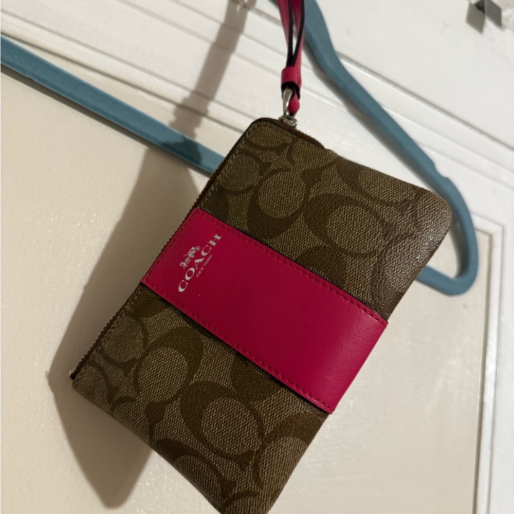 COACH Mini Wristlet.